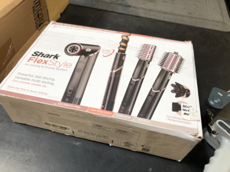 Photo 1 of Shark FlexStyle Hair Dryer & Powerful Styling System with 6-Piece Hair Styling Tools, Paddle Brush, Curl-Defining Hair Diffuser, Auto-Wrap Curlers, Styling Concentrator, Oval Brush &, Black, HD440BK