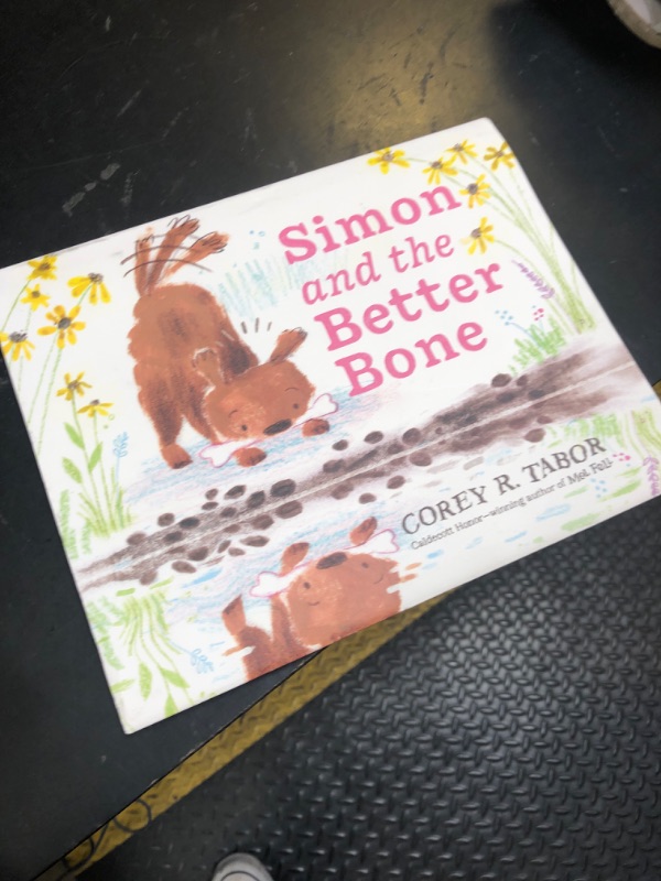 Photo 1 of Simon and the Better Bone Hardcover – Picture Book, May 9, 2023
