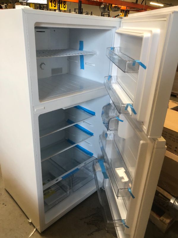 Photo 1 of Kenmore 33 in. 20.5 cu. ft. Capacity Refrigerator/Freezer with Full-Width Adjustable Glass Shelving, Humidity Control Crispers, ENERGY STAR Certified, White