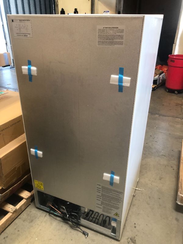 Photo 1 of Kenmore 33 in. 20.5 cu. ft. Capacity Refrigerator/Freezer with Full-Width Adjustable Glass Shelving, Humidity Control Crispers, ENERGY STAR Certified, White