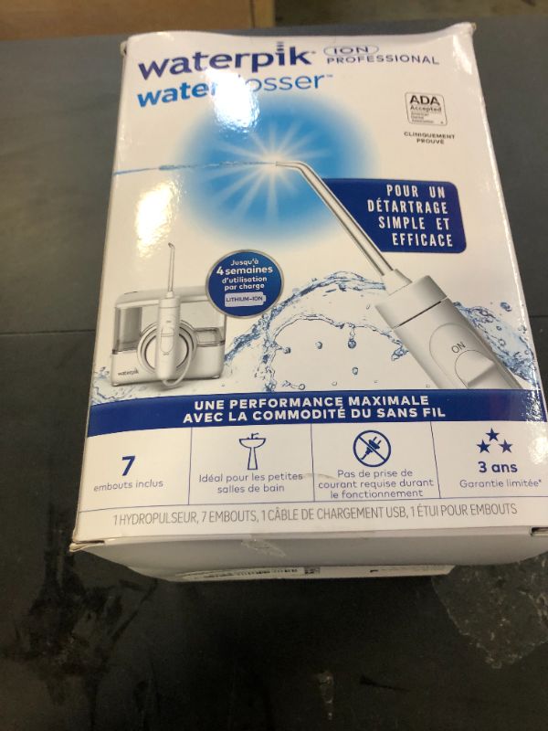 Photo 1 of Waterpik ION Professional Water Flosser, Rechargeable and Portable for Teeth, Gums, Braces, 10 Settings, 7 Flossing Tips For Multiple Users And Needs, ADA Accepted, WF-12 White, Packaging May Vary