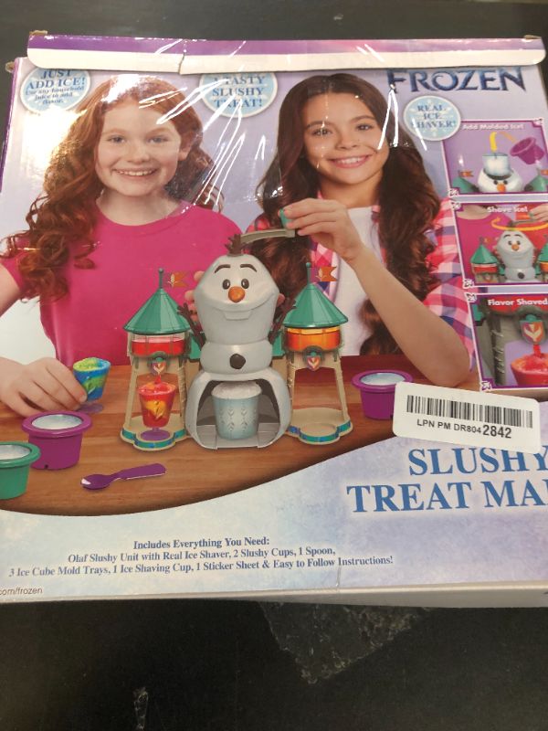 Photo 1 of Disney Frozen II Slushy Treat Maker Includes Slushy Unit, Ice Shaver, Ice Cube Molds, Ice Bucket, Slushy Cup & Spoon
