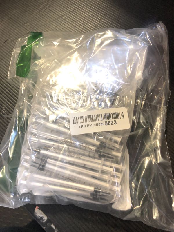 Photo 1 of 100 Pack 1ml Syringe with Cap for Liquid, 1cc Plastic Small Syringes with Cover, Non-Sterile, No Needle