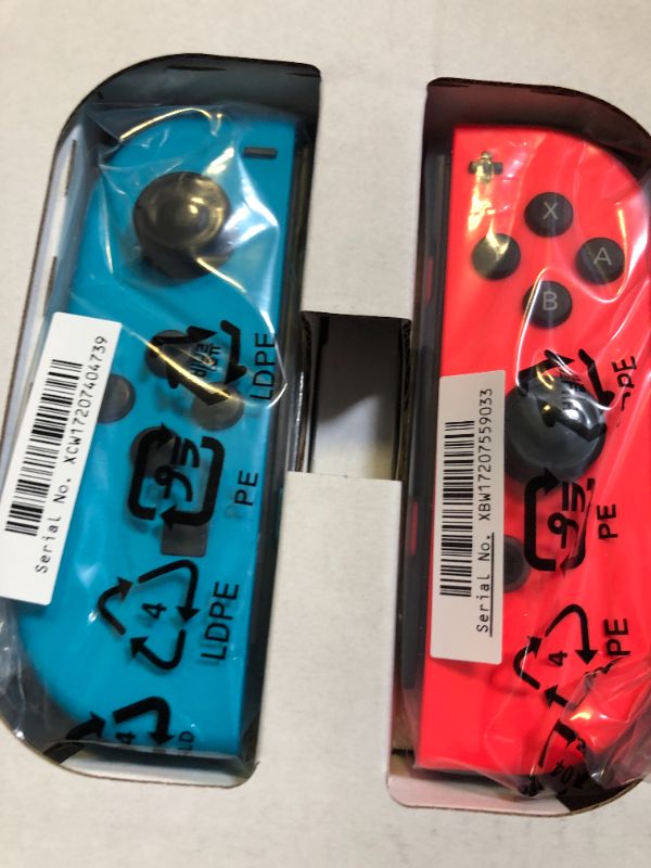 Photo 1 of Nintendo Switch – OLED Model w/ Neon Red & Neon Blue Joy-Con
