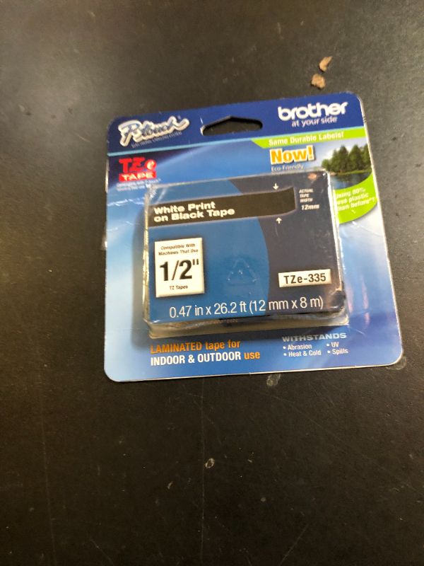 Photo 1 of Brother Genuine P-touch TZE-335 Label Tape, 1/2" (0.47") Standard Laminated P-touch Tape, White on black, Laminated for Indoor or Outdoor Use, Water Resistant, 26.2 Feet (8M), Single-Pack