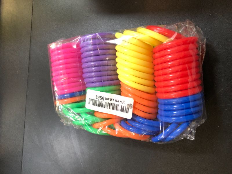 Photo 1 of Plastic Rings for Ring Toss - 70PCS Mini Ring Toss Game 2.1 Inch Plastic Carnival Rings for Adults for Wedding Can Toss Game Pool Ring Toss Game Rainbow