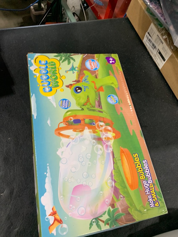Photo 1 of Bubble  Bubble Machine Dinosaur Bubble Blower Toy for Kids and Toddlers Bubble in Bubble Gun Party Favors Birthday Christmas Easter Gift for 3 4 5 6 7 8 9 Years Old Boys and Girls (Yellow)