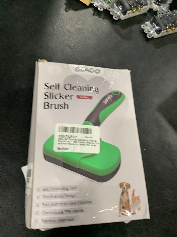 Photo 1 of Dipoo Self Cleaning Deshedding Brush for Dogs & Cats - Skin Friendly Grooming Tool with Hair Removal for Haired Pets, Green
