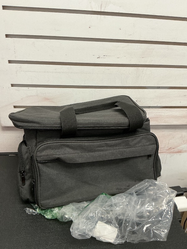 Photo 1 of Grey travel bag used 