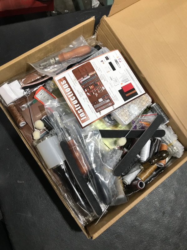 Photo 1 of TLKKUE Leather Tooling Kit Leather Craft Tools Leather Working Kit with Custom Handbag Cutting Mats Engraving Punching Sewing Stamping Sanding Tools Leather Tools for Leather Working Professional