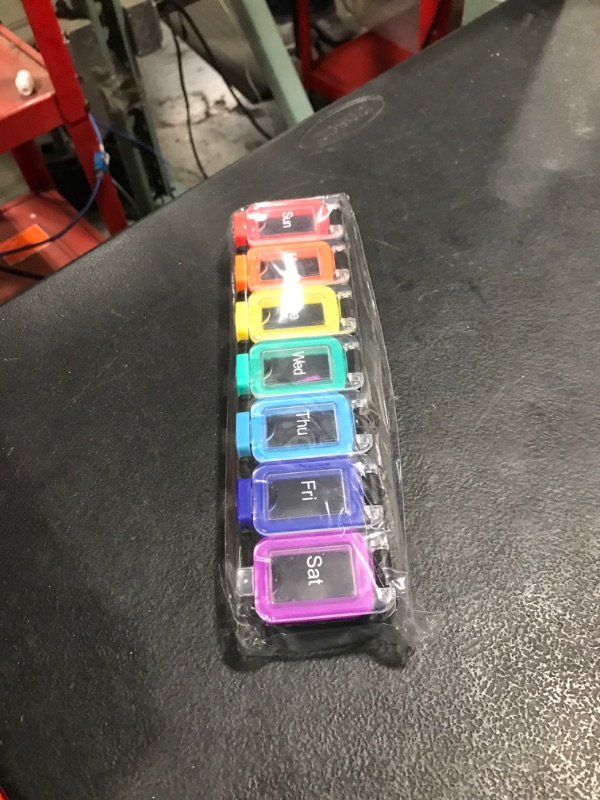 Photo 1 of EZY DOSE Weekly (7-Day) Pill Planner, Medicine Case, Vitamin Organizer Box, Waterproof Locking Compartments to Secure Prescription Medication and Prevent Accidental Spilling, Rainbow
