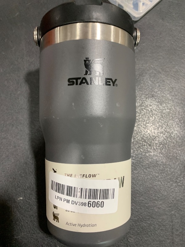 Photo 1 of Stanley IceFlow Flip Straw Tumbler with Handle 20 oz | Twist On Lid and Flip Up Straw | Leak Resistant Water Bottle | Insulated Stainless Steel |BPA-Free | Charcoal