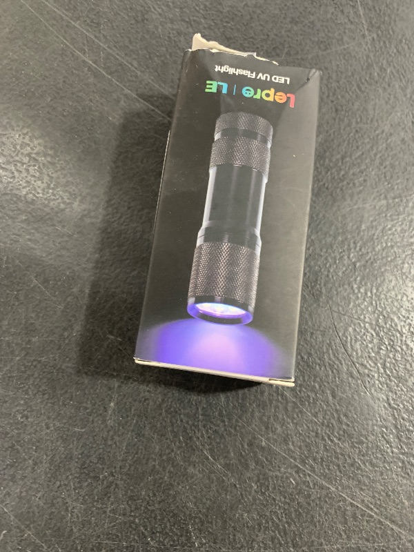Photo 1 of Lighting EVER Black Light Flashlight, Small UV Lights 395nm, Portable Ultraviolet Light Detector for Invisible Ink Pens, Dog Cat Pet Urine Stain, AAA Batteries Included