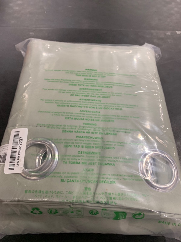 Photo 1 of NICETOWN 100% Blackout Window Curtain Panels, Cold and Full Light Blocking Drapes with Black Liner for Nursery, 84 inches Drop Thermal Insulated Draperies (Greyish Green, 2 Pieces, 52" Wide per Panel)