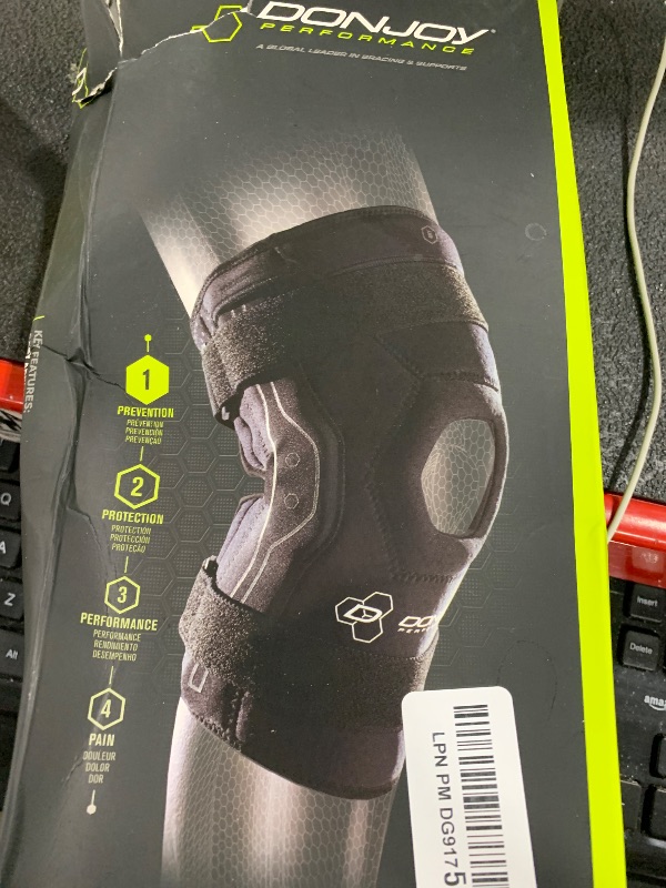 Photo 1 of DonJoy Performance Bionic Knee Support Brace: Black, Medium