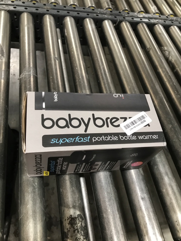 Photo 1 of Baby Brezza Superfast Portable Baby Bottle Warmer – 67% Faster - Travel Breastmilk Warmer and Formula Warmer - Safe, Even Heating - Up to 9oz - No Adapters, Black