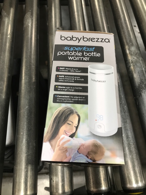 Photo 1 of Baby Brezza Superfast Portable Baby Bottle Warmer – 67% Faster - Travel Breastmilk Warmer and Formula Warmer - Safe, Even Heating - Up to 9oz - No Adapters, White