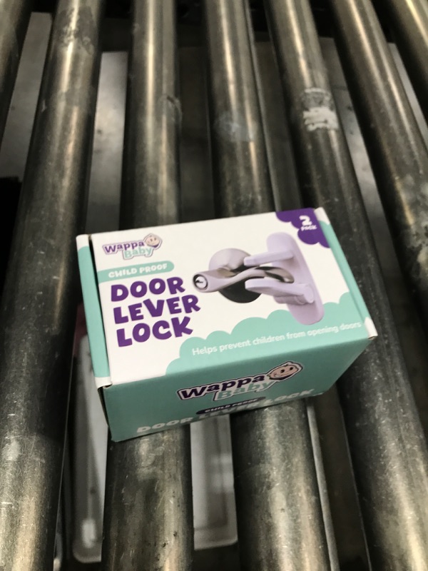 Photo 1 of Door Lever Lock (2 Pack) – Prevents Toddlers from Opening Doors – Easy One-Hand Operation for Adults – Durable ABS with 3M Adhesive Backing – No Tools Needed for Install