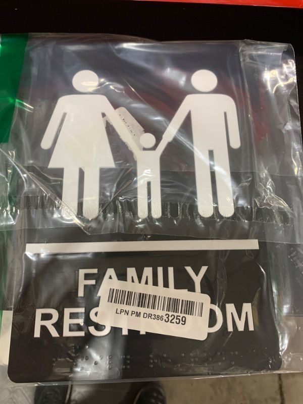 Photo 1 of ComplianceSigns.com Family Restroom Sign, ADA-Compliant Braille and Raised Letters, 9x6 inch White on Black Acrylic with Adhesive Mounting Strips
