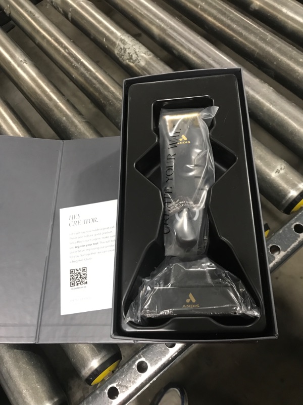 Photo 1 of Andis 74150 GTX-EXO Professional Cord/Cordless Lithium-ion Electric Beard & Hair Trimmer with Charging Stand, Black
