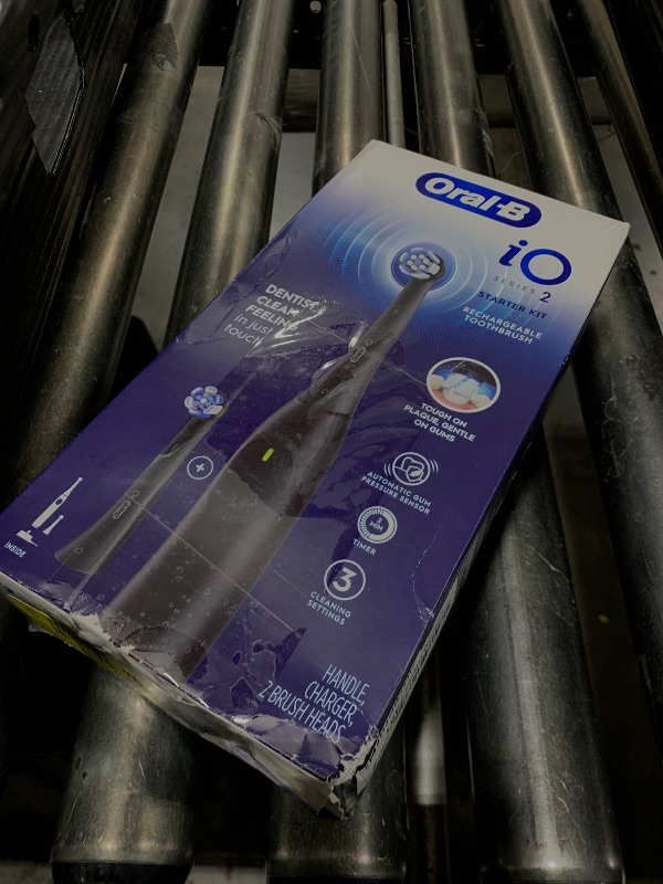 Photo 1 of Oral-B iO Series 2 Rechargeable Electric Powered Toothbrush Starter Kit, Night Black with 2 Brush Heads - Automatic Pressure Sensor to Protect Gums - 3 Modes - 2 Min Timer