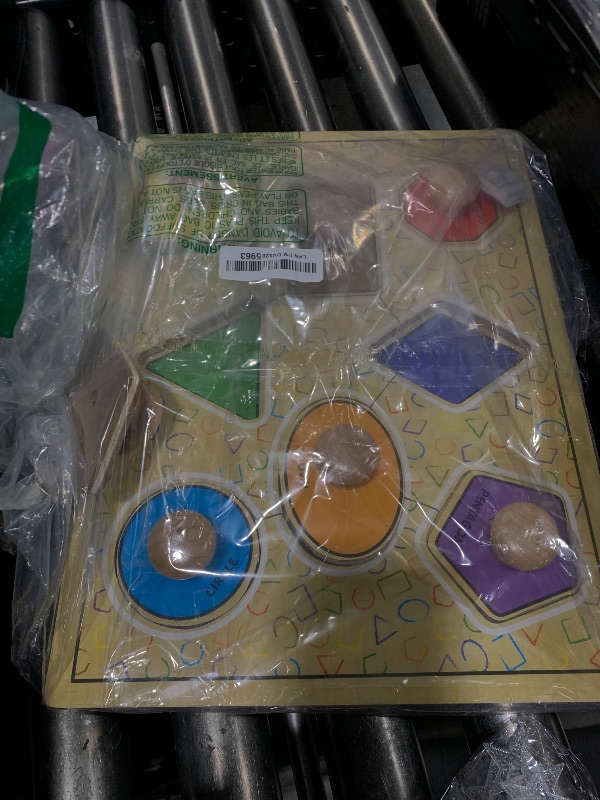 Photo 1 of Melissa & Doug Deluxe Jumbo Knob Wooden Puzzle - Geometric Shapes (8 pcs)