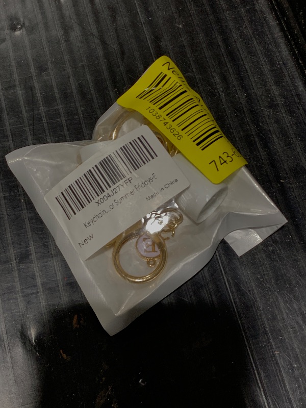 Photo 1 of KEYCHAIN CHAPSTICK LIDS 