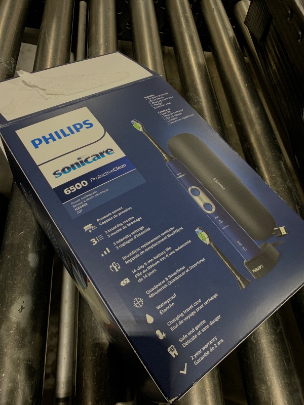 Photo 1 of Philips Sonicare ProtectiveClean 6500 Rechargeable Electric Toothbrush, with Pressure Sensor, 3 Cleaning Modes, SmarTimer and QuadPacer, 14-Day Battery Life, Charging Travel Case, Navy Blue, HX6462/07