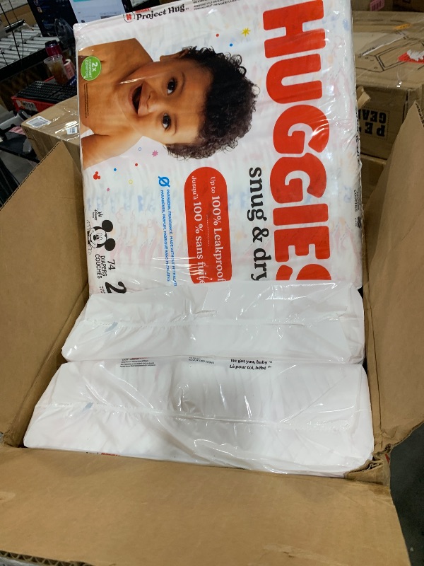 Photo 1 of Huggies Size 2 Diapers, Snug & Dry Baby Diapers, Size 2 (12-18 lbs), 222 Count (3 Packs of 74), Packaging May Vary