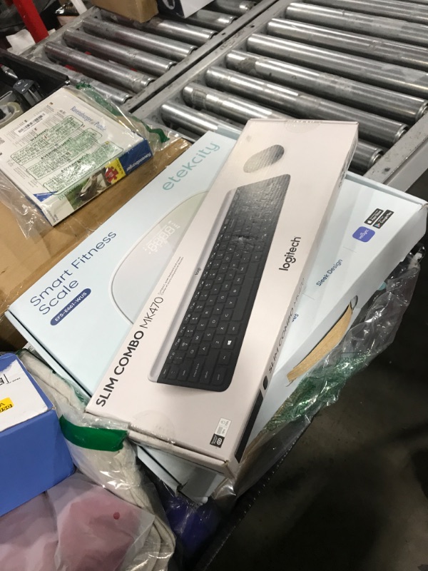 Photo 1 of Logitech MK470 Slim Wireless Keyboard and Mouse Combo - Modern Compact Layout, Ultra Quiet, 2.4 GHz USB Receiver, Plug n' Play Connectivity, Compatible with Windows - Graphite