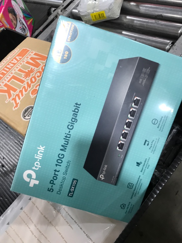 Photo 1 of TP-Link TL-SX105 | 5 Port 10G/Multi-Gig Unmanaged Ethernet Switch | Desktop/Wall-Mount | Plug & Play | Fanless | Sturdy Metal Casing | Speed Auto-Negotiation