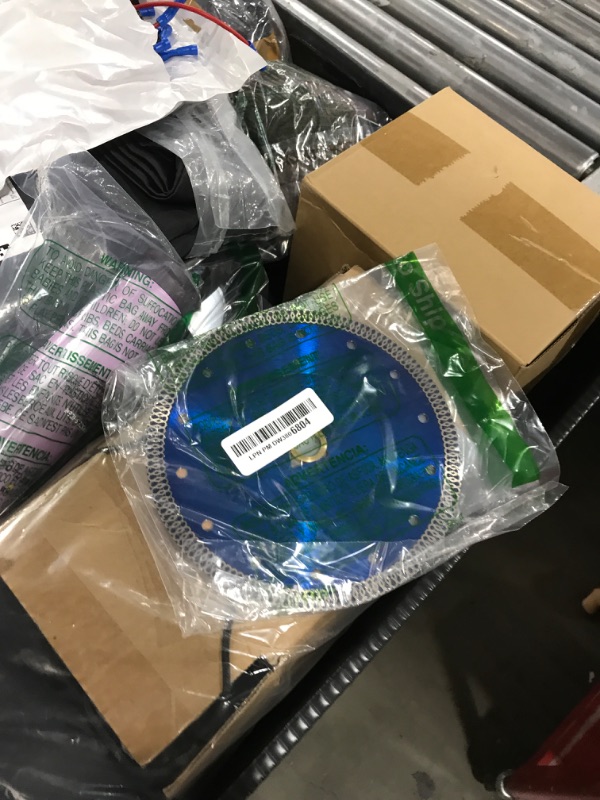 Photo 1 of Super Thin Tile Saw Blade 7" Diamond Saw Blade for Cutting Granite Marble Porcelain Tile (7")