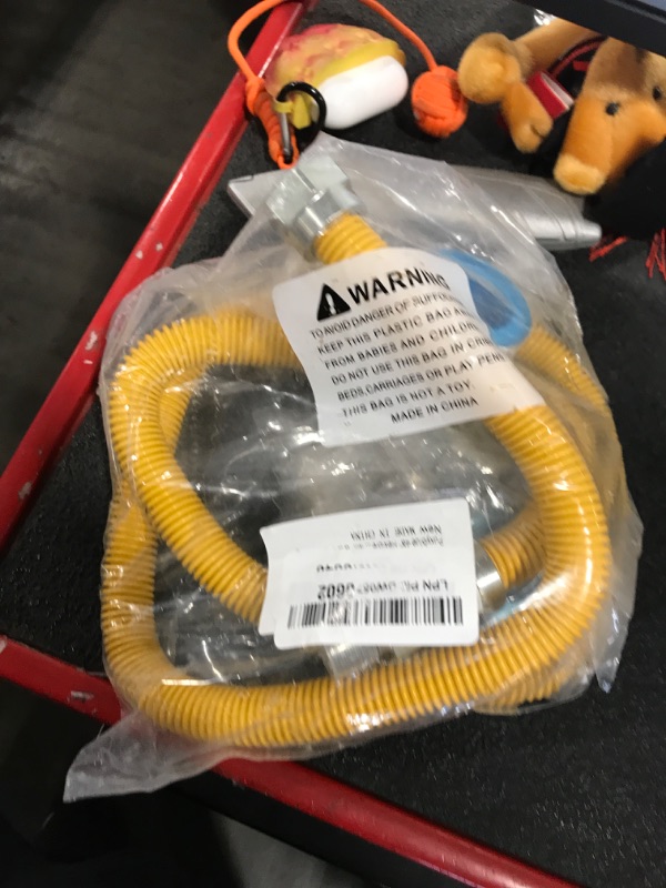 Photo 1 of Puxyblue 48" Flexible Gas Line Kit for Dryer, Stove, Range, Flexible Stainless Steel Gas Dryer Connector Kit, 5/8 in.OD(1/2 in. ID?Dryer Gas Line with Connector 1/2" FIP & 1/2" MIP & 3/4" MIP Fitting