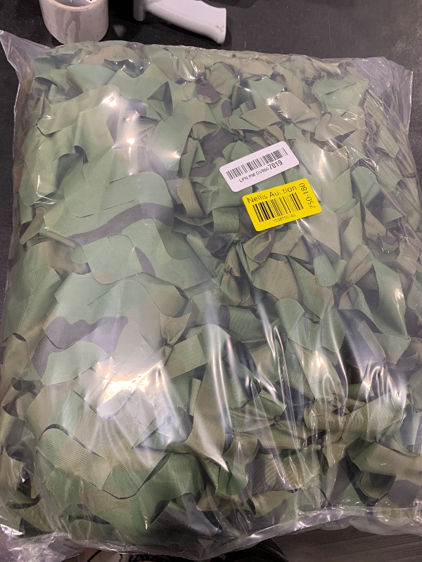 Photo 1 of FLYEGO Camo Netting Camouflage Netting, Bulk Roll Mesh Nets Camouflage Nets Military Surplus for for Hunting Blind Sunshade Car Cover Party Decorations (9.84ft*19.68ft/3m*6m, Woodland)