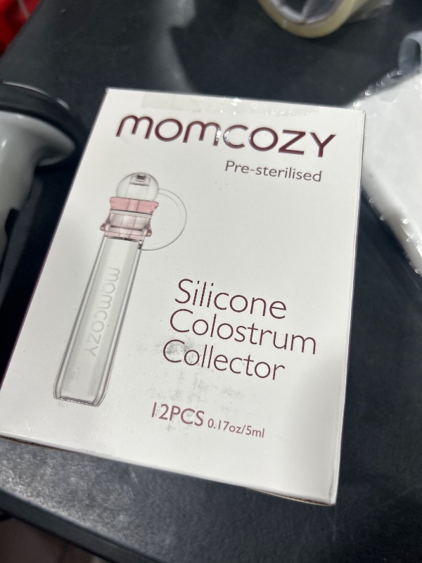 Photo 1 of Momcozy Colostrum Collector Reusable Breast Milk Collector with Storage Case and Cotton Wipe, Portable Colostrum Container BPA Free, Multi-Use Collector 5ml-12pcs