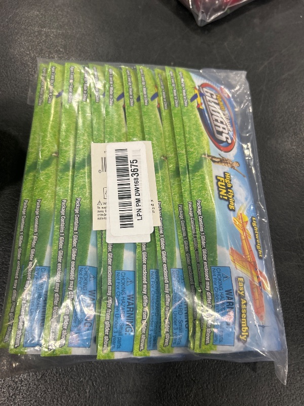 Photo 1 of Rhode Island Novelty 8 Inch Flying Glider Plane, Set of 12 Multicolor