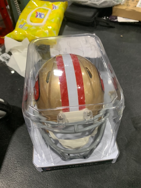 Photo 1 of Riddell unisex Revolution Speed Mini Helmet, Team Color, One Size US