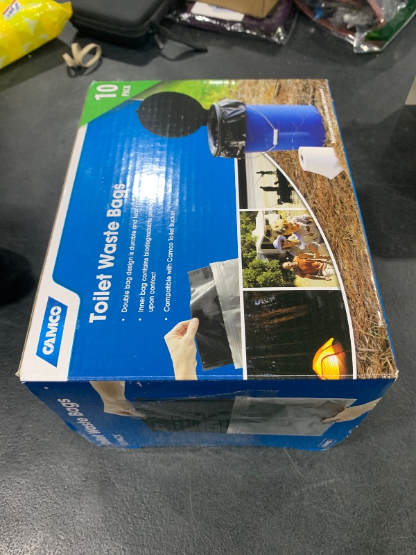 Photo 1 of Camco Toilet Waste Bags - Features Biodegradable Powder & Leak Proof Double Bag Design - Great for Camping, RVing, Hiking, or Boating - 10-Pack (41548)