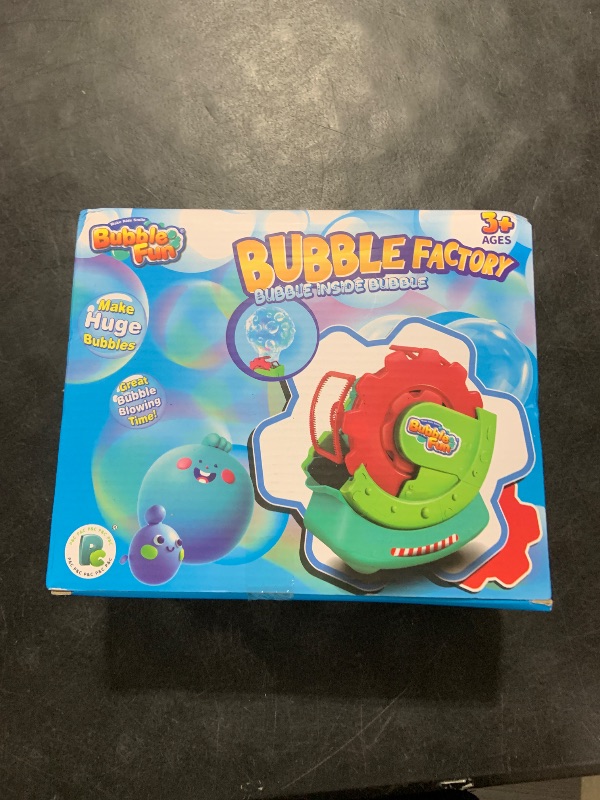 Photo 1 of Bubble Machine for Toddlers Kids, Blower With 8oz Solution, Make Extra Large & Bubbles in Bubble, Maker Toy for Indoor Outdoor Birthday Party