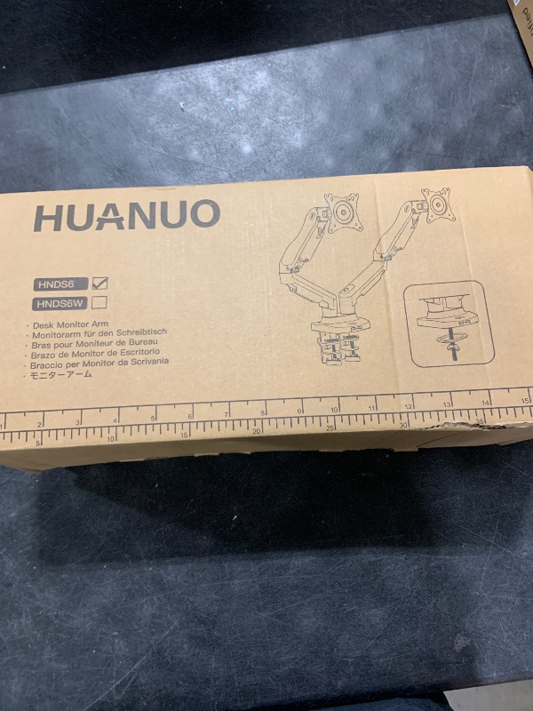 Photo 1 of HUANUO Dual Monitor Stand - Full Adjustable Monitor Desk Mount Swivel Vesa Bracket with C Clamp, Grommet Mounting Base for 13 to 32 Inch Computer Screens - Each Arm Holds 4.4 to 19.8lbs