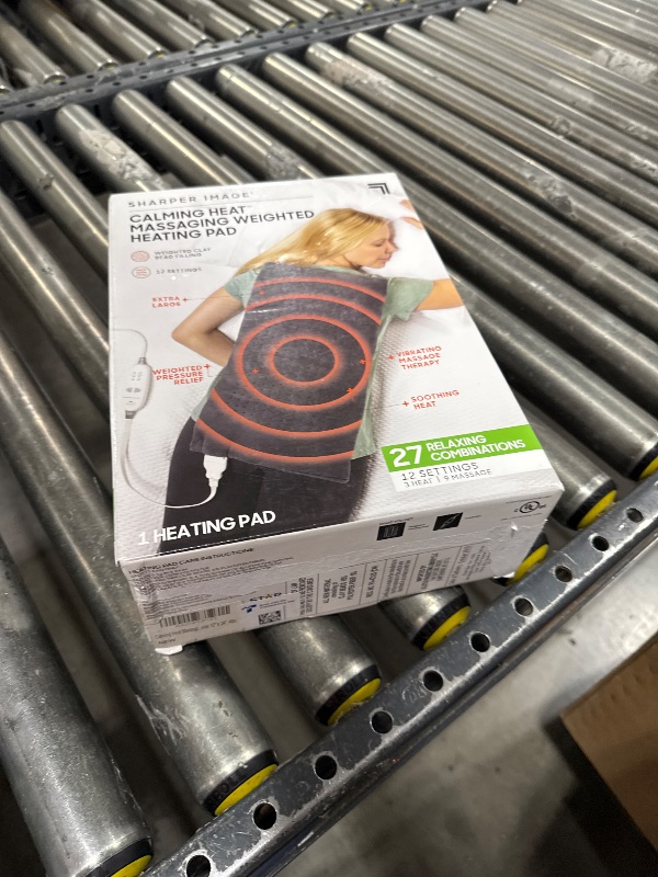 Photo 1 of Calming Heat Massaging Weighted Heating Pad by Sharper Image- Electric Heating Pad with Massaging Vibrations, Auto-Off,12 Settings- 3 Heat, 9 Massage- 27 Relaxing Combinations, 12” x 24”, 4lbs