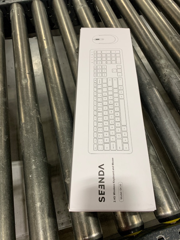 Photo 1 of Wireless Keyboard and Mouse Combo - Full Size Slim Thin Wireless Keyboard Mouse with Numeric Keypad 2.4G Stable Connection Adjustable DPI (White & Silver)