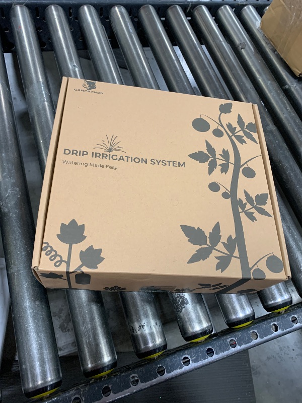 Photo 1 of CARPATHEN Drip Irrigation System - Adjustable Premium Irrigation System for Garden, Raised Beds - Complete Drip Irrigation Kit with Drip Emitters, 5/16" and 1/4" Irrigation Tubing and Barbed Fittings