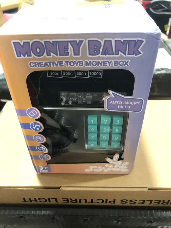 Photo 1 of Refasy Kids Toys for Boys Girls Age 3-5,Electronic Piggy Banks for Kids Money Savings Box Toys Mini ATM Coin Bank for Children Best Birthday Xmas Gifts Cash Coin Can for Kid 8-12 Year Old Black
