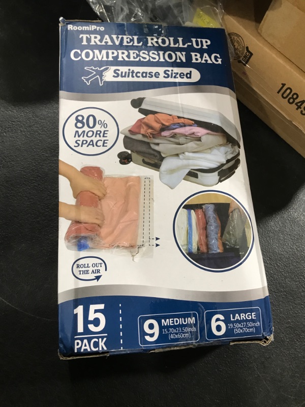 Photo 1 of 15 Compression Bags for Travel, Roll Up Space Saver Bags for Travel, Saves 80% of Storage Space for Packing & Clothes, No Pump or Vacuum Needed