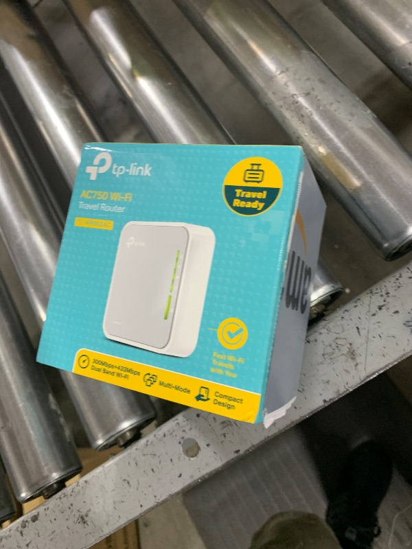 Photo 1 of TP-Link AC750 Wireless Portable Nano Travel Router(TL-WR902AC) - Support Multiple Modes, WiFi Router/Hotspot/Bridge/Range Extender/Access Point/Client Modes, Dual Band WiFi, 1 USB 2.0 Port
