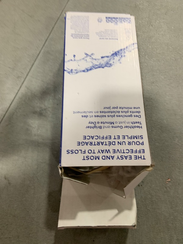 Photo 1 of Waterpik Cordless Pulse Rechargeable Portable Water Flosser for Teeth, Gums, Braces Care and Travel with 2 Flossing Tips, Waterproof, ADA Accepted, WF-20 White, Packaging May Vary