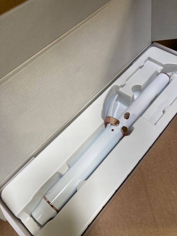 Photo 1 of T3 SinglePass Curl X Extra-Long Barrel Curling Iron with 9 Heat Settings and Ceramic Barrel for Fast Styling and Lasting Results on All Hair Types