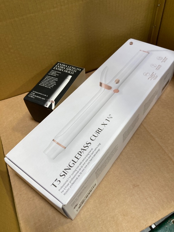 Photo 1 of T3 SinglePass Curl X Extra-Long Barrel Curling Iron with 9 Heat Settings and Ceramic Barrel for Fast Styling and Lasting Results on All Hair Types