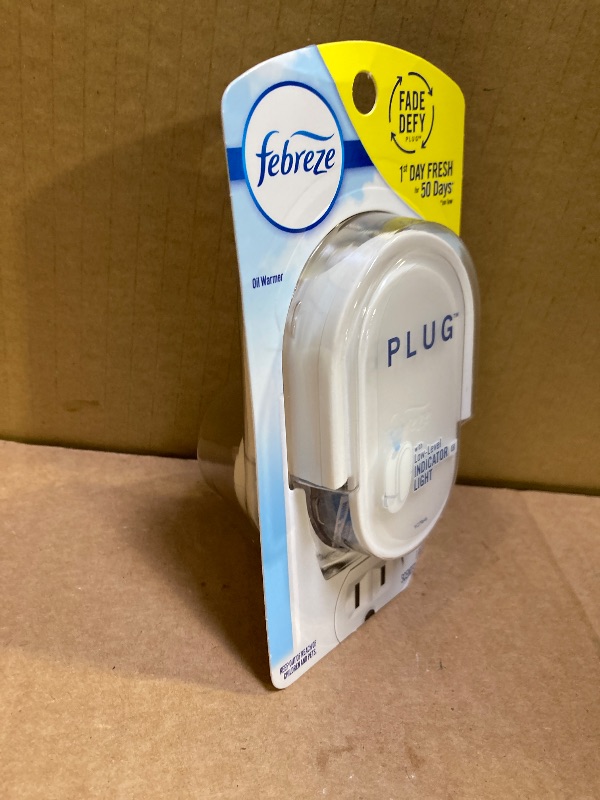 Photo 1 of Febreze Plug Starter Kit